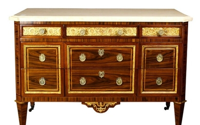 A French Regency style marble top commode