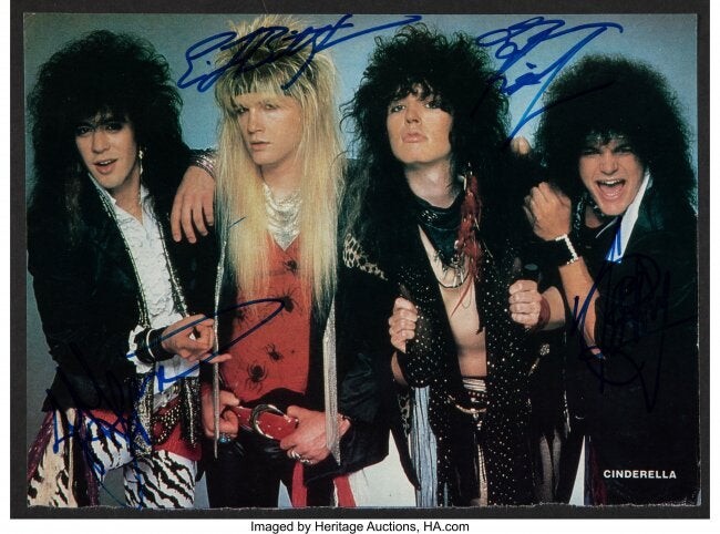 89868: Cinderella Band Signed Magazine Page. A picture