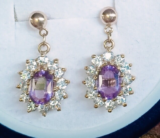9k gold earrings with natural Bolivian amethysts and zircons
