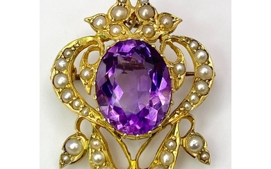 A 15K Yellow Gold Amethyst and Seed Pearl Brooch/Pendant. 1....