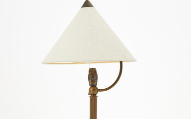 A 1930s/40s table lamp. patinated metal.