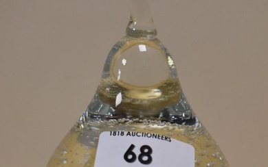 A 20th Century clear or Flint art glass paperweight, in the form of a pear with controlled bubble