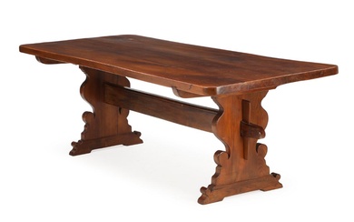 A 20th century Baroque style dark polished elmwood refectory table with baluster...