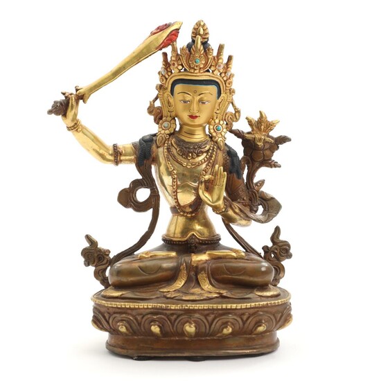 NOT SOLD. A 20th century Tibetan partial gilt and painted bronze figure of Buddha. H. 22 cm. – Bruun Rasmussen Auctioneers of Fine Art