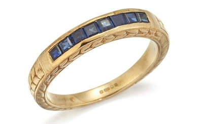 A 9CT HALF HOOP SAPPHIRE RING, the half hoop ring with