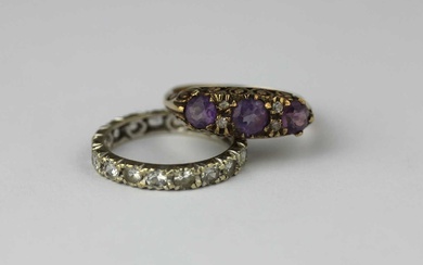 A 9ct gold amethyst and colourless gemset ring