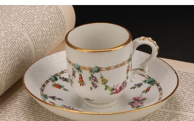 A Bristol coffee cup and saucer, basket weave moulded border...