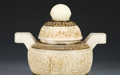 A CARVED JADE STONE INCENSE BURNER WITH DOUBLE HANDLES