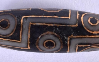 A CHINESE TIBETAN GOLD INLAID AGATE BEAD. 3.5 cm wide.