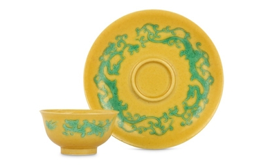 A CHINESE YELLOW-GROUND GREEN 'DRAGON' TEA BOWL AND SAUCER.