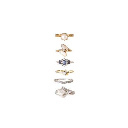 A COLLECTION OF SIX GOLD STONE SET DRESS RINGS, including tw...
