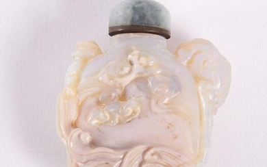 A Chinese Carved Opal Snuff Bottle