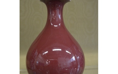 A Chinese Sang de Boeuf vase.