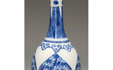A Chinese blue and white vase, 19th c, painted with blue gro...