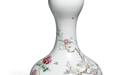 A Chinese garlic neck porcelain vase decorated in colours with birds seated at flowering branches at rock, above the moon. Marked Qianlong, but 1900. H. 37 cm.
