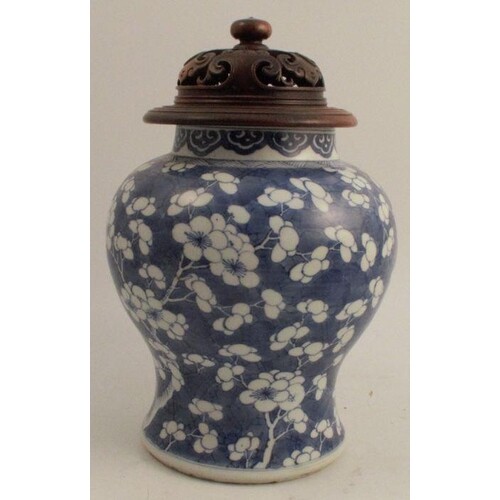 A Chinese late Kangxi baluster shaped blue and white jar, th...