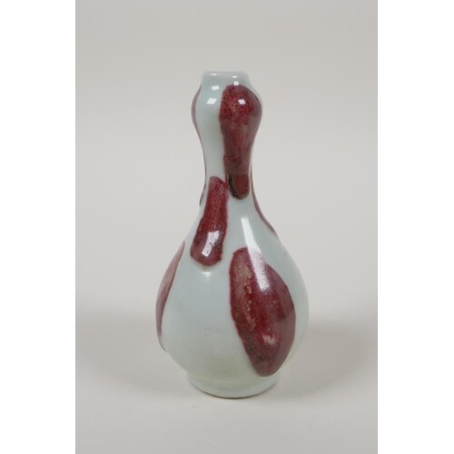 A Chinese red and white spot glazed porcelain spill vase, 5"...
