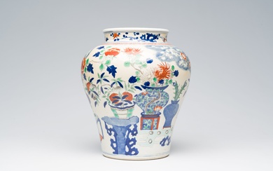 A Chinese wucai 'flower baskets' jar, 19th C.