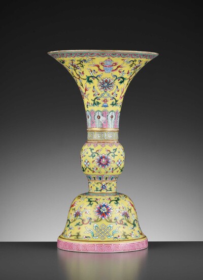 A FAMILLE-ROSE YELLOW-GROUND ‘BAJIXIANG’ ALTAR VASE, GU, LATE QING TO REPUBLIC 清末民初粉彩黃地八吉祥花觚
