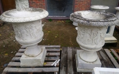 A GOOD PAIR OF ITALIAN CARVED WHITE MARBLE URNS , the