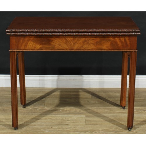 A George III mahogany rectangular tea table, folding top wit...