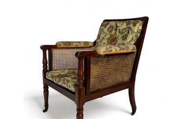A George IV mahogany library bergere The rectangular caned ...
