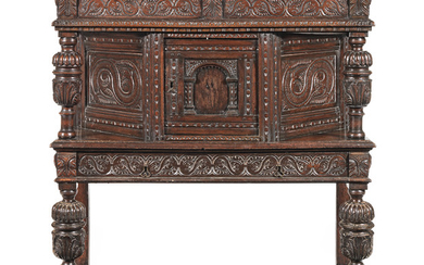 A James I joined oak and elm canted court cupboard, Gloucestershire, circa 1610