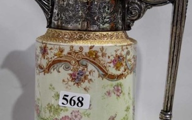 A LATE VICTORIAN CERAMIC AND SILVER PLATE FLAGON