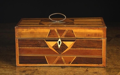 A Late 18th/Early 19th Century Parquetry Tea Caddy. The rectangular box clad in geometric panels of