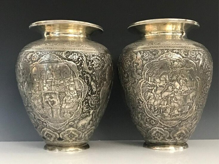 A MAGNIFICENT PAIR OF PERSIAN SILVER VASES