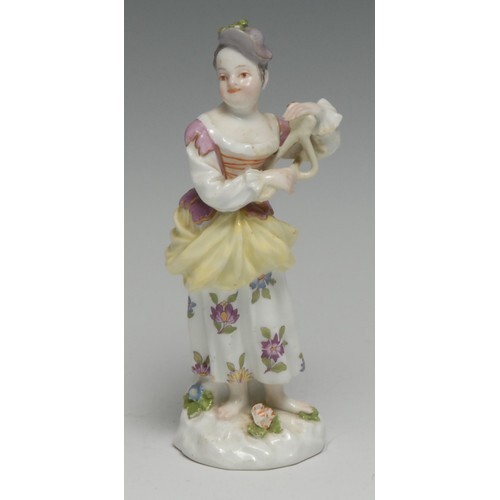 A Meissen figure, of a young girl playing the triangle, in c...