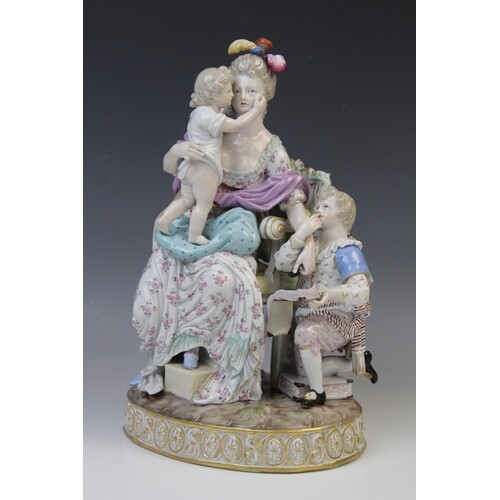 A Meissen porcelain figure group titled 'Love and Reward' by...