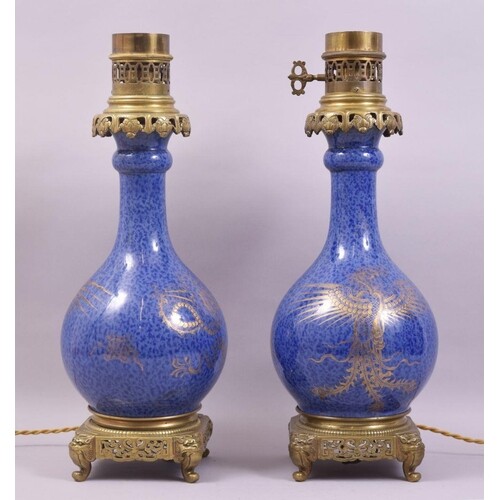 A PAIR OF CHINESE BLUE GROUND AND GILT DECORATED PORCELAIN L...