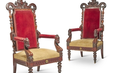 A PAIR OF CONTINENTAL CARVED WALNUT ARMCHAIRS, CIRCA 1870