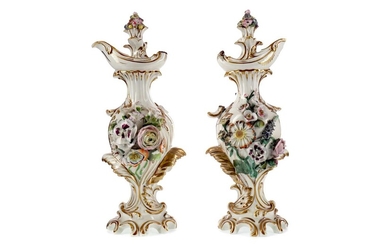 A PAIR OF EARLY 19TH CENTURY DERBY PORCELAIN EWERS AND STOPPERS