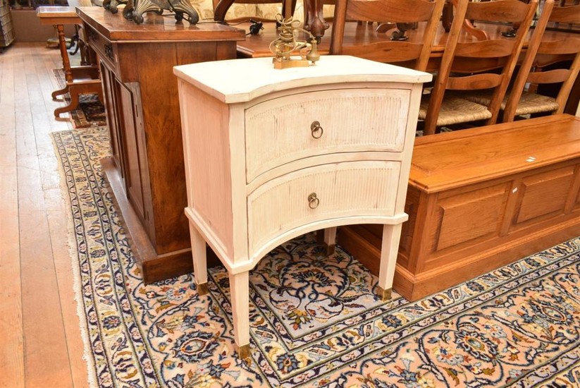 A PAIR OF GUSTAVIAN STYLE PAINTED BEDSIDE TABLES