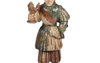 A POLYCHROME DECORATED WOODEN FIGURE, IN THE 16TH CENTURY MEDIEVAL STYLE