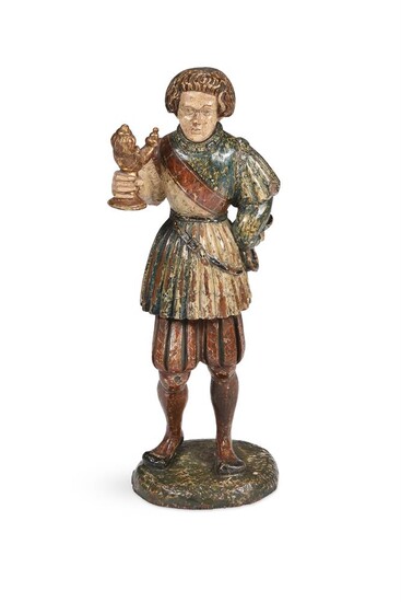 A POLYCHROME DECORATED WOODEN FIGURE, IN THE 16TH CENTURY MEDIEVAL STYLE