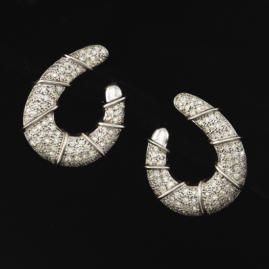 A Pair of Gold and Diamond Earrings