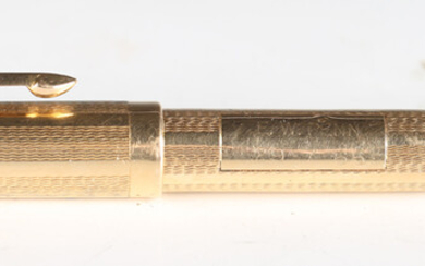 A Parker 51 gold cased fountain pen, detailed '18K', the body and lid with engine turned d