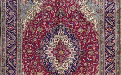 A Persian Hand Knotted Tabriz Carpet, 395 X 297