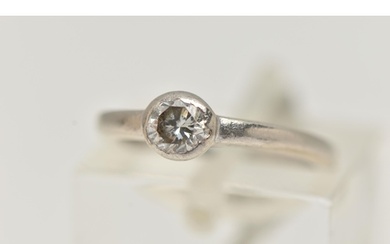 A SINGLE STONE DIAMOND RING, a round brilliant cut diamond b...