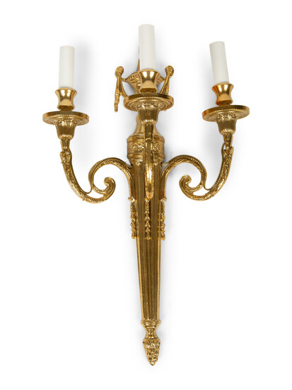 A Set of Four Louis XVI Style Three-Light Brass Sconces