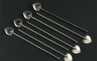 A Set of Seven Sterling Silver Stir Straws.