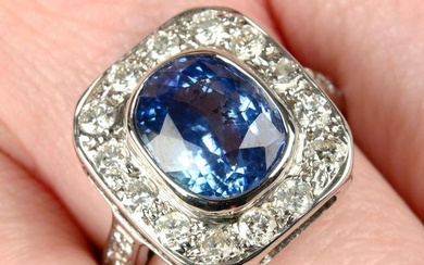 A Sri Lankan sapphire and brilliant-cut diamond dress ring.With photocopy of report 5782-2055, dated