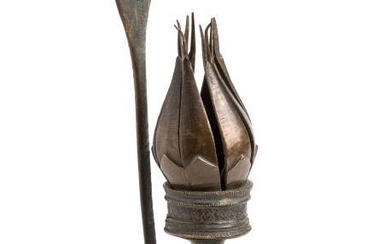 A TEMPLE LAMP IN THE FORM OF A LOTUS,...