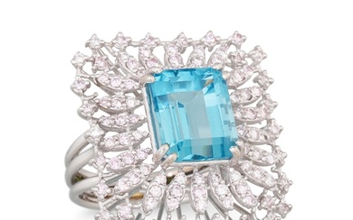 A TOPAZ AND DIAMOND RING, the trap cut topaz to a light pink...