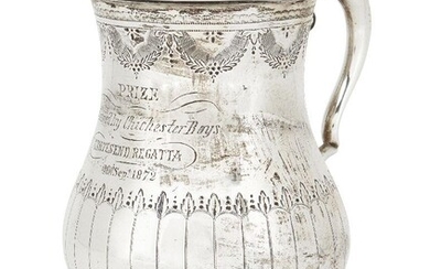 A Victorian silver tankard, London, c.1872, Henry Holland, the baluster body engraved with garlands and a foliate band to double scroll handle with acanthus thumbpiece, presentation engraving for ‘Chichester Boys at Gravesend Regatta’, 13cm high...