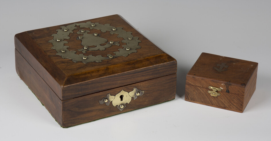 A Victorian walnut and brass mounted box, enclosing a selection of gaming counters and whist markers