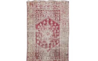 A WOVEN CARPET, PROBABLY TURKISH